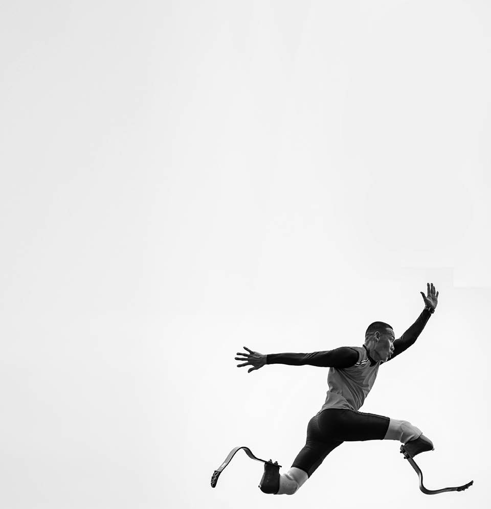 athlete runner physically disabled run on track of stadium